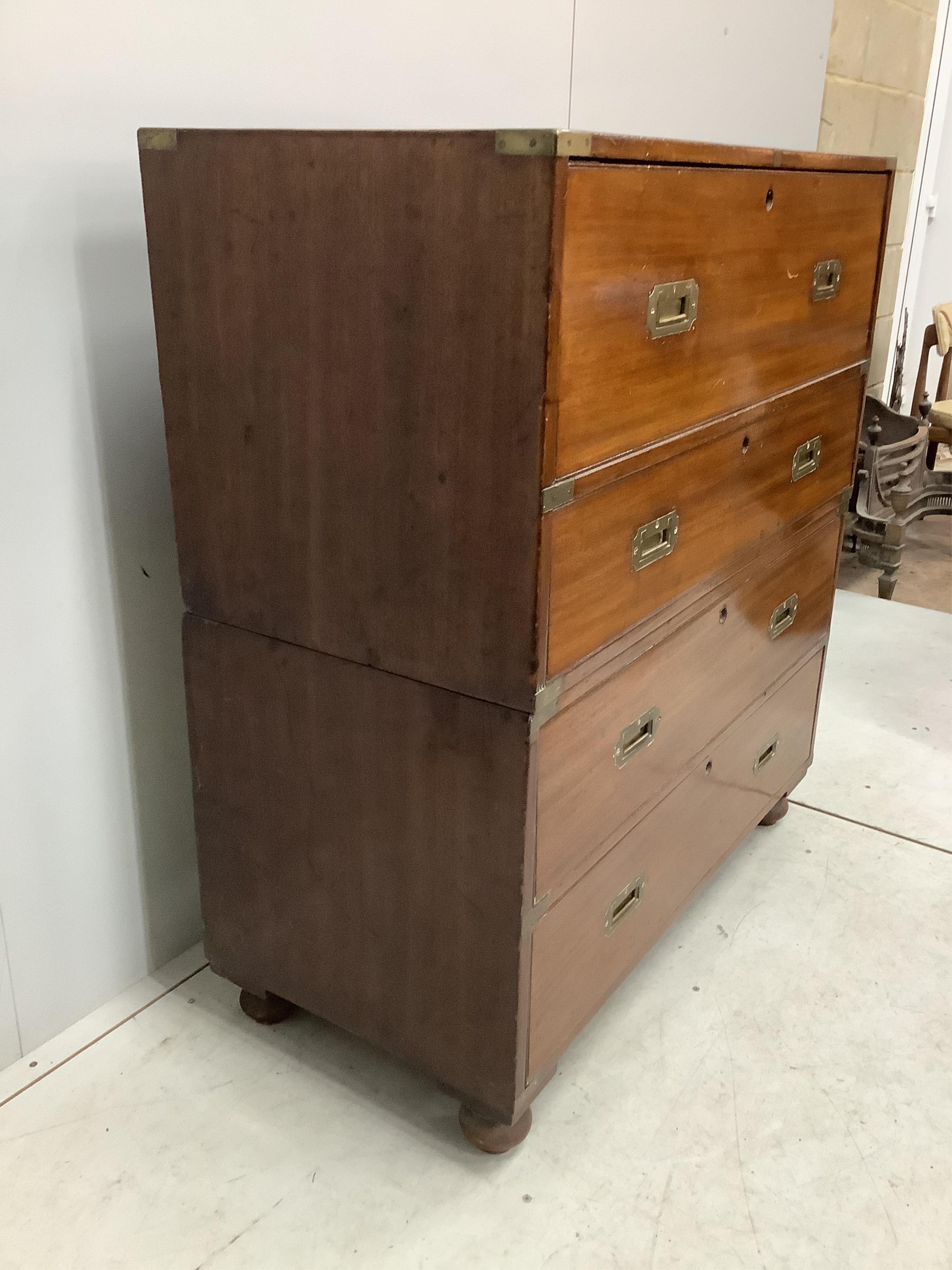 A Victorian brass mounted mahogany two part secretaire military chest with later pigeonhole interior, width 98cm, depth 47cm, height 109cm. Condition - fair, lacking all escutcheons